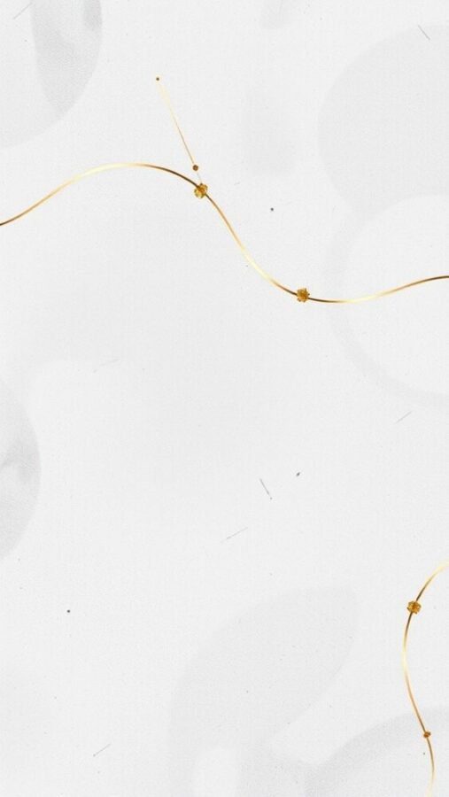 Elegant wallpaper with gold foil accents on a light background