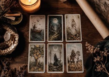 soulmate origin reading tarot cards and sketch flat lay