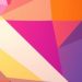Colorful abstract geometric pattern featuring various shapes and shades.