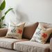 Cozy sofa with customized throw pillows featuring unique designs and floral patterns.