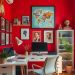 A home office with bold red walls, modern furniture, and decorative elements.