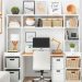 A bright home office with a desk, computer, and organized shelves featuring baskets and decorative items.