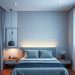 A modern bedroom featuring a geometric patterned accent wall, stylish bed, and warm lighting.