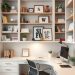 A stylish home office with built-in desk and shelves, featuring books, plants, and decorative items.