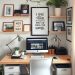 A cozy home office with a desk, computer, plants, and decorative shelves.