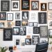 A gallery wall with various framed quotes and photos in a home office setting.