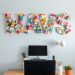 Colorful DIY wall art spelling 'WAVS' made from fabric swatches, displayed above a desk with a computer.