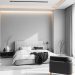 A minimalist bedroom featuring a gray color scheme, a bed with white linens, a black accent chair, and natural decor elements.