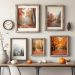 Rustic wall art display featuring autumn-themed framed pictures, a clock, and decorative pumpkins on a wooden table.