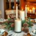 A rustic dining table centerpiece featuring pumpkins, pinecones, and candles.
